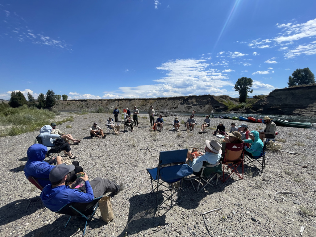River rangers and managers discuss common issues and share solutions at the 2025 River Ranger Rendezvous on the Snake River. Photo by Mari Griffin.. River rangers and managers discuss common issues and share solutions at the 2025 River Ranger Rendezvous on the Snake River. Photo by Mari Griffin.