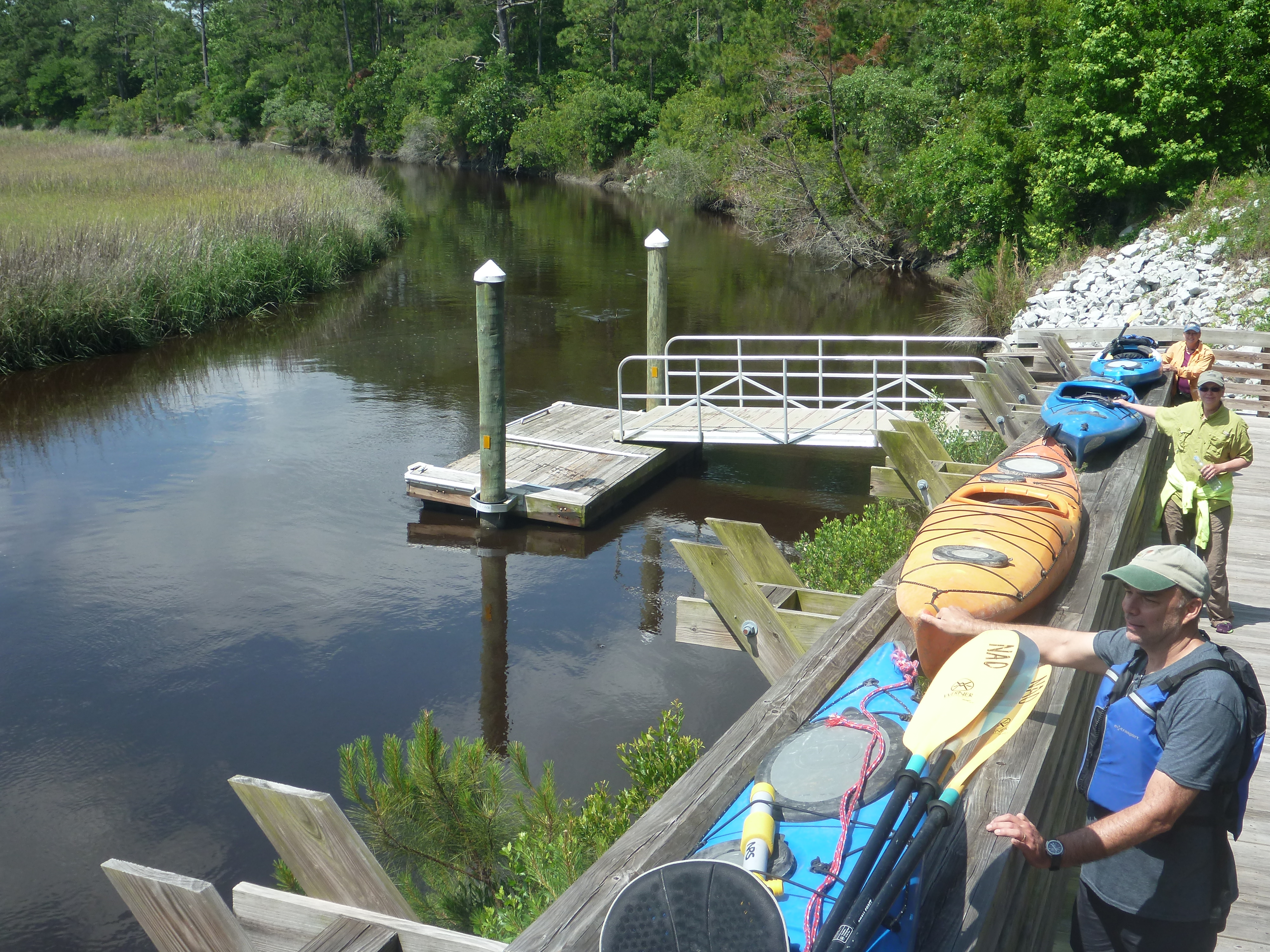 This purpose-built kayak ramp at Awendaw Creek Canoe Launch in South Carolina provides staging room for several boats, leaving the small dock (with launch assist mechanism) free for active launches.